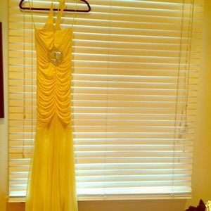 Formal form fitting yellow gown