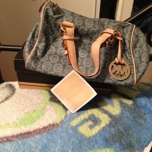Authentic small sized MK bag