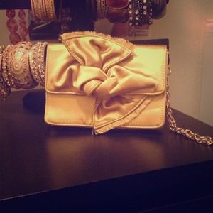 BCBG MAXAZRIA Gold evening clutch...