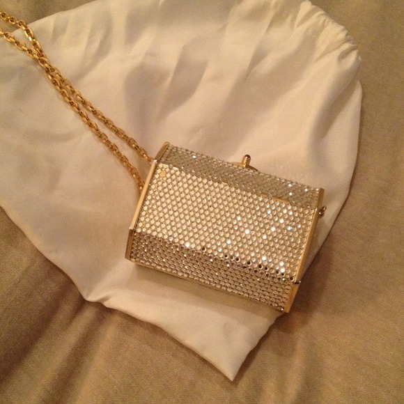 Judith Lieber swarvoski crystal with gold trim.