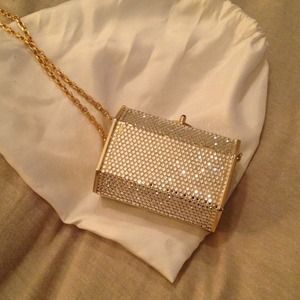 Judith Lieber swarvoski crystal with gold trim.