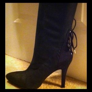 Black kneehigh BCBG boots; laces up the back