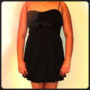 Super cute short black thin strapped dress.