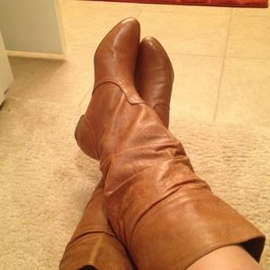 Steve Madden camel color boots.