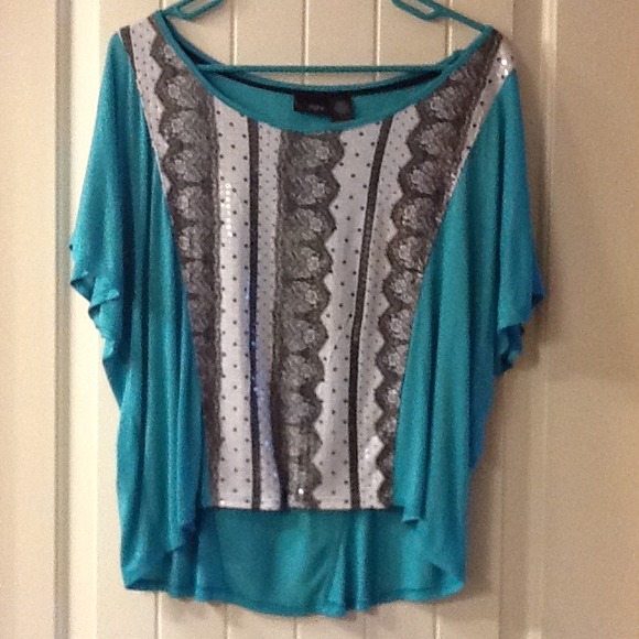 SOLD**Turquoise top with black and white lace