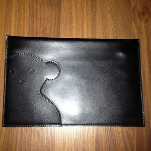 Tous leather clutch