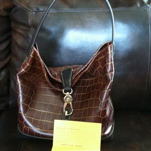 Dooney & Bourke purse! Brand new with reg. card!