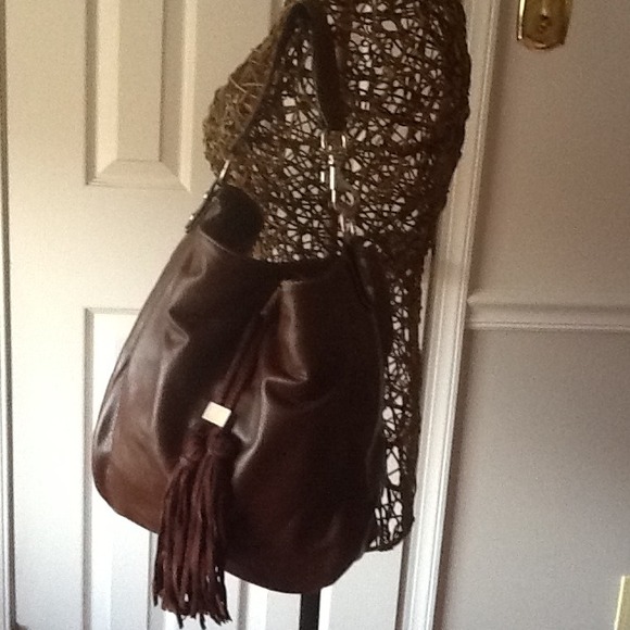Brown handbag with fringe on front