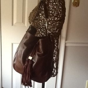 Brown handbag with fringe on front