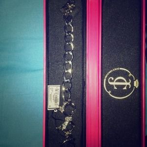 Bow juicy couture bracelet.