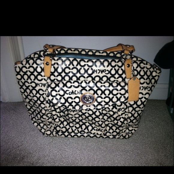 $68 Coach covered canvas cross body and hand bag.