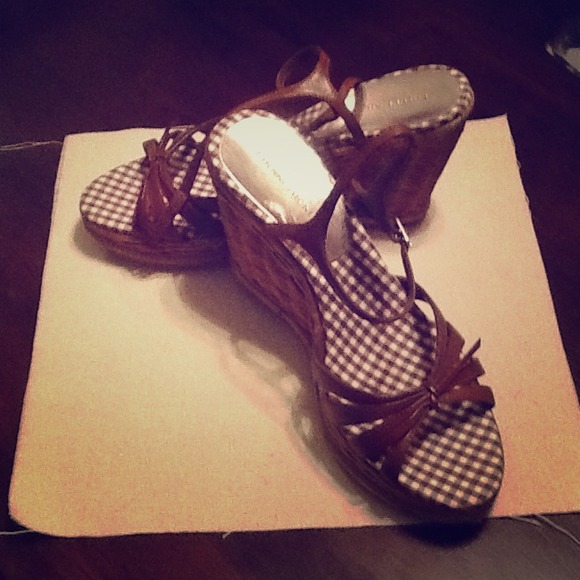 Brown and white checked shoes
