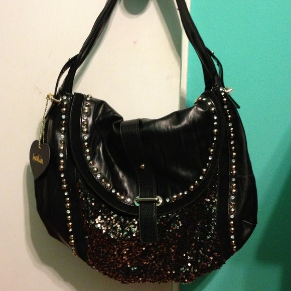 Black imoshion purse. New!