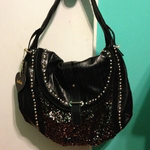 Black imoshion purse. New!