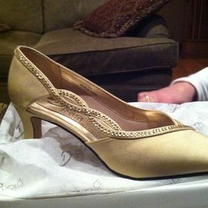 Gold pumps by dolce Meyer
