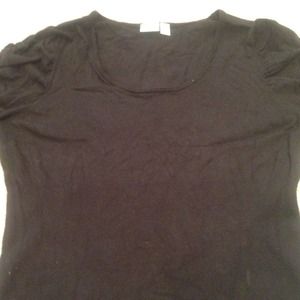 Short sleeve sweater with gathered sleeves.