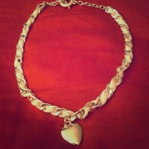 Silver ribboned necklace , heart charm