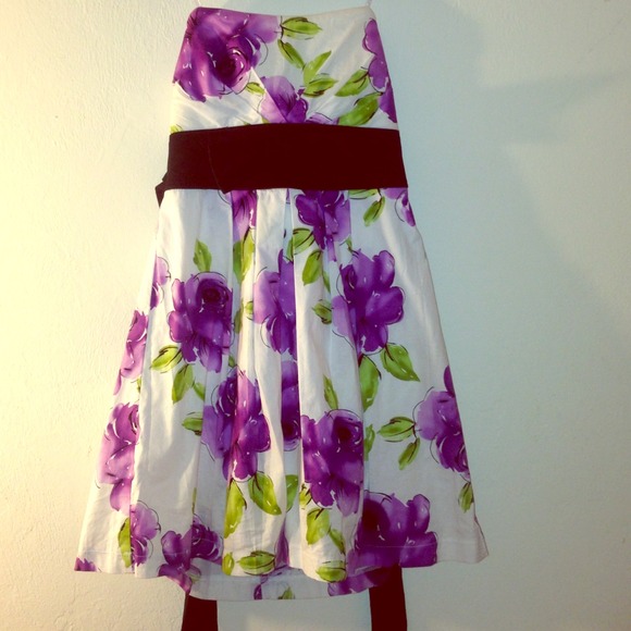 Purple and white flower dress with a bow in front