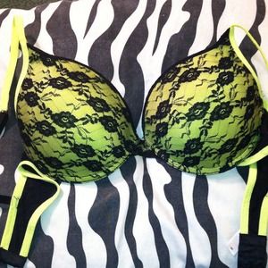 %Heavily padded neon yellow with black lace bra