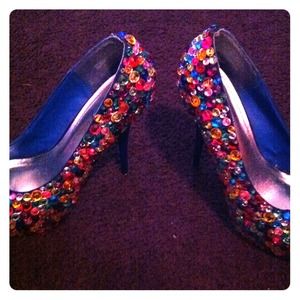 Blue five inch heels. With Multi color stones