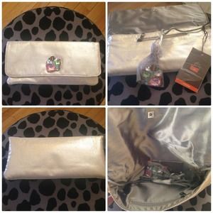 Silver clutch with crystal design Silver clutch with crystal design