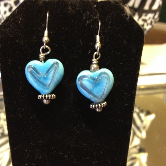 Blue lamp work and silver earrings.