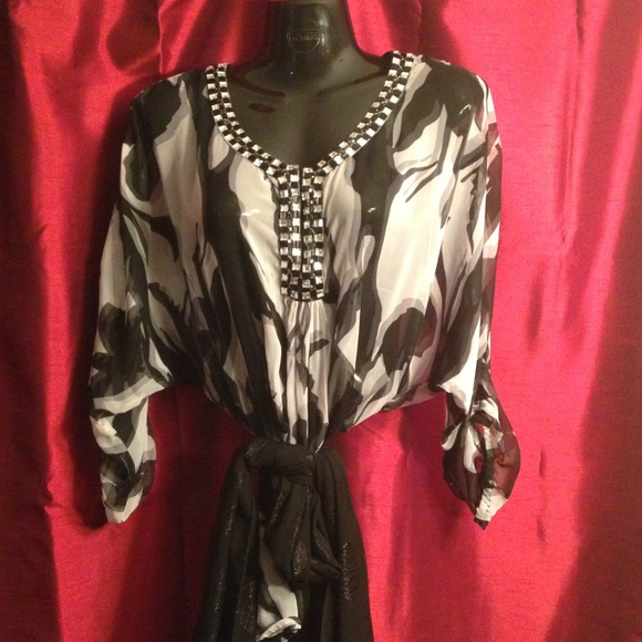 ...On hold....Black and white beautiful top