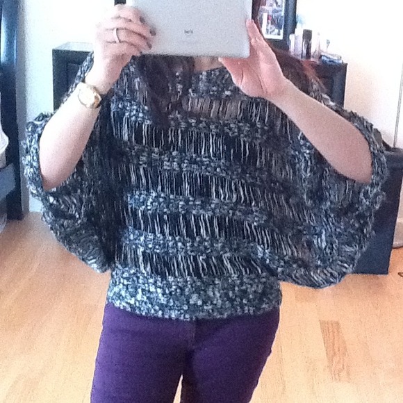 Sold Black and white see thru sweater.  Size s/p.