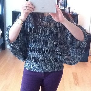 Sold Black and white see thru sweater.  Size s/p.