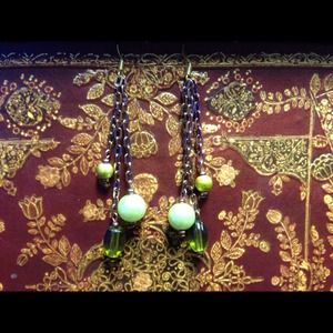 Green dangling earrings