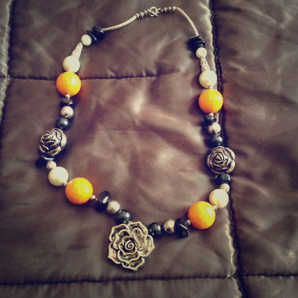 Orange with pearl and black necklace :)