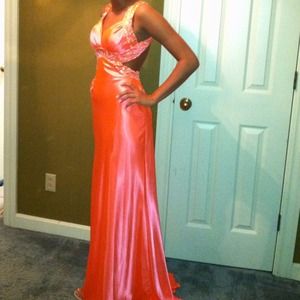 Coral prom dress with slight side cut outs