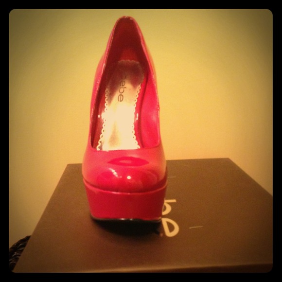 (Bebe red heels)only used once!
