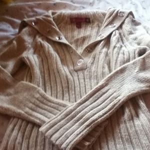 A tan sweater very warm and so adorable