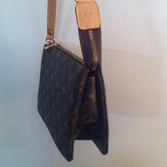 Louis Vuitton small hand bag.