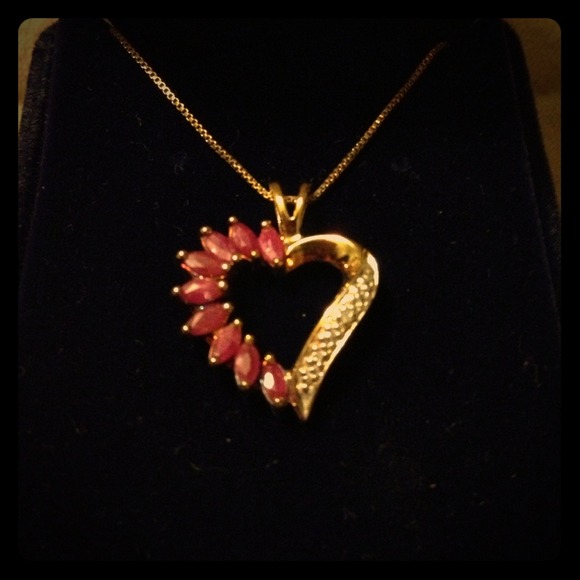 Gold, ruby, and diamond heart necklace