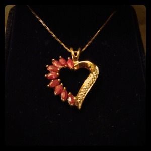 Gold, ruby, and diamond heart necklace