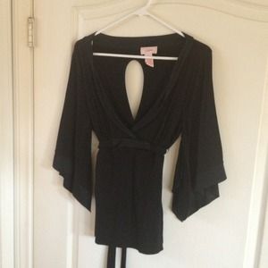 Black blouse with cut out on back, wing sleeves