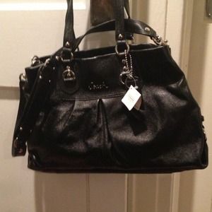 Coach purse.  "RESERVE"