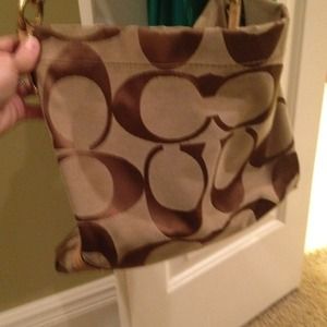 Large "C" coach purse.