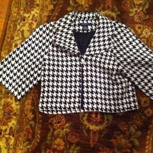Black and white jacket with one button close