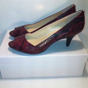 Calvin Klein Red and Black Snakeskin pumps. NWT !