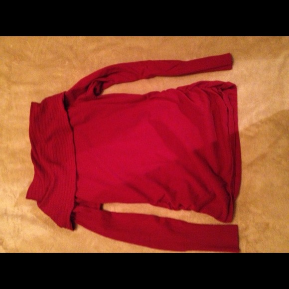 Adorable red sweater.