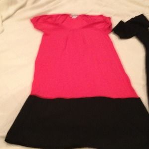 Two cute knit dresses. Black one still with tags.