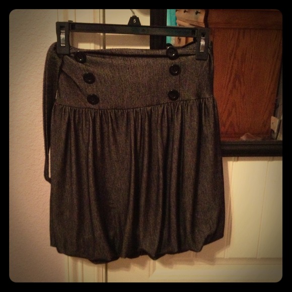 High waist dark gray skirt with straps.