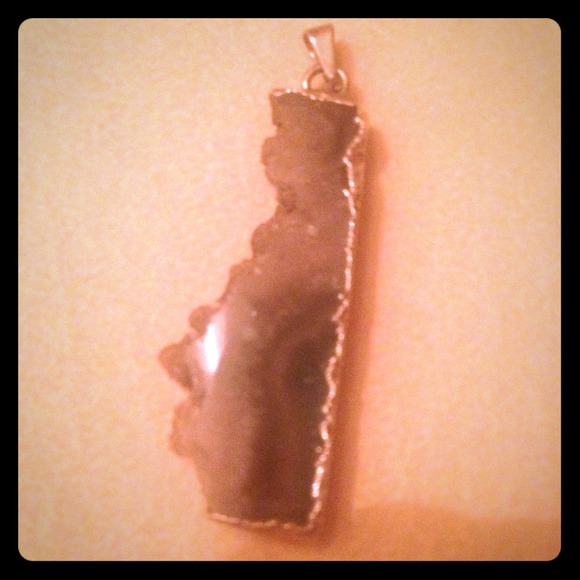 Traded Raw amethyst pendant
