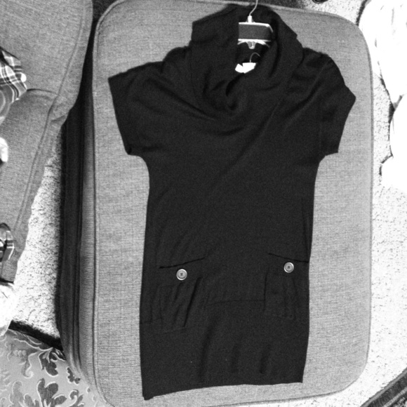 Black sweater dress. Button pockets. Brand new