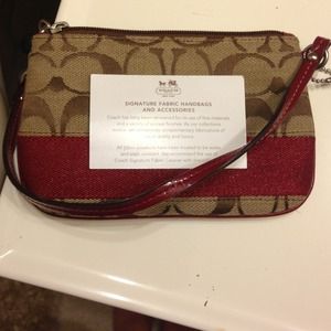 ••SOLD•• NWOT Coach wristlet very cute.