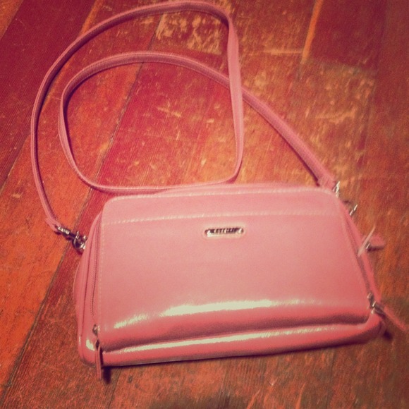 Pink cross body bag.
