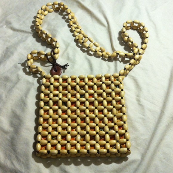 The Sak purse wood beads flower crossover bag